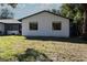 The exterior of this home features clean horizontal siding at 8436 Cameo St, Spring Hill, FL 34608