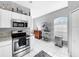 Kitchen featuring stainless steel appliances and granite countertops at 14 Seagrape Cir, Clearwater, FL 33759