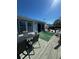 Exterior deck with table and seating at 1564 S Michigan Ave, Clearwater, FL 33756