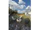 Spacious backyard area featuring outdoor seating and a fire pit at 1564 S Michigan Ave, Clearwater, FL 33756