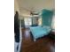 Spacious main bedroom with wood floors, an accent wall, and plenty of natural light at 1564 S Michigan Ave, Clearwater, FL 33756
