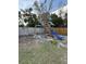 Large playground for enjoyment fenced in backyard at 1564 S Michigan Ave, Clearwater, FL 33756