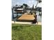 A private boat dock and lift provides waterfront access for boating and recreation at 16103 4Th E St, Redington Beach, FL 33708