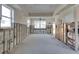 Open concept living area ready for remodel with exposed framework and block wall construction at 16103 4Th E St, Redington Beach, FL 33708