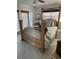 Bedroom featuring a four-poster bed, natural light, and neutral tones at 16103 4Th E St, Redington Beach, FL 33708