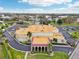 An aerial view of the building showcasing its architectural design and surrounding landscaping at 2400 Franciscan Dr # 34, Clearwater, FL 33763