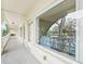 View of the condo patio showing the outdoor living space and neighborhood at 2400 Franciscan Dr # 34, Clearwater, FL 33763