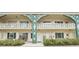 Charming condo complex featuring well-maintained landscaping and beautiful architectural accents at 2400 Franciscan Dr # 34, Clearwater, FL 33763