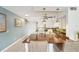 Updated kitchen boasting white cabinets, modern appliances, and a breakfast bar for casual dining at 2400 Franciscan Dr # 34, Clearwater, FL 33763