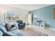 Inviting living room area with calming color palette and scenic views at 2400 Franciscan Dr # 34, Clearwater, FL 33763