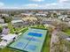 Aerial view of the tennis courts and surrounding landscaping at 2400 Franciscan Dr # 34, Clearwater, FL 33763