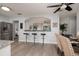 Bright, renovated kitchen with stainless steel appliances and counter seating at 2800 57Th N St, St Petersburg, FL 33710