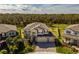 Beautiful home with a spacious yard, located near a lush wooded area at 3150 Marine Grass Dr, Wimauma, FL 33598