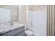 Bathroom featuring single sink with white marble countertops, a shower-tub combo, and white walls at 3324 Ivy Hollow Dr, Plant City, FL 33565