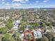 Aerial view of the home in a mature neighborhood close to the water and city at 3607 S Hubert Ave, Tampa, FL 33629