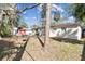 Spacious backyard with mature trees, an outbuilding and plenty of room for activities at 3607 S Hubert Ave, Tampa, FL 33629