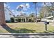 A well-kept single-Gathering home with a spacious front lawn and mature landscaping at 3607 S Hubert Ave, Tampa, FL 33629