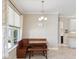 Eat-in kitchen features breakfast nook with large window at 3667 Arbor Chase Dr, Palm Harbor, FL 34683