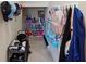Mud room with tile floors and wall hooks for easy organization at 3667 Arbor Chase Dr, Palm Harbor, FL 34683