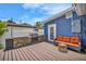 Relax on the outdoor deck with a stone grill area and a comfortable seating area at 3727 38Th N St, St Petersburg, FL 33713