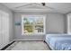 Bedroom filled with natural light featuring hardwood floors, and neutral decor at 3727 38Th N St, St Petersburg, FL 33713
