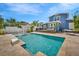 Outdoor pool area offering a serene backyard with ample seating, deck, and an in-ground basketball hoop at 3727 38Th N St, St Petersburg, FL 33713