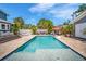 Backyard pool provides a relaxing atmosphere with ample patio space, ideal for recreation and leisure at 3727 38Th N St, St Petersburg, FL 33713