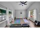 Recreation room with plenty of natural light, yoga mats, weights, and a ceiling fan at 3727 38Th N St, St Petersburg, FL 33713