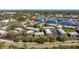 Aerial view of condominiums surrounded by lush greenery with easy access to nearby roads at 3847 35Th S Way # 108, St Petersburg, FL 33711