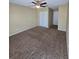 Bedroom showcasing neutral carpet, a ceiling fan, and ample space for furniture arrangement at 4224 Winding River Way, Land O Lakes, FL 34639