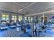 Well-equipped gym with treadmills, elliptical machines, and weight training equipment at 4627 Tramanto Ln, Wesley Chapel, FL 33543