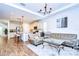 Open-concept living area with kitchen island, and comfortable seating perfect for entertaining and relaxing at 4627 Tramanto Ln, Wesley Chapel, FL 33543