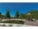 Community playground featuring swings, slides, and other recreational equipment for children at 4627 Tramanto Ln, Wesley Chapel, FL 33543