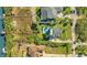 Lush backyard with inground pool, boardwalk and nearby boat dock at 4707 Troydale Rd, Tampa, FL 33615