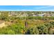 Backyard and Boardwalk surrounded by trees and shrubbery at 4707 Troydale Rd, Tampa, FL 33615