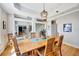 Beautiful dining room showcases stylish lighting, and easy access to other living spaces at 4707 Troydale Rd, Tampa, FL 33615