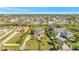 Stunning waterfront homes with manicured lawns and lush landscaping line a canal neighborhood at 4707 Troydale Rd, Tampa, FL 33615