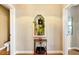 Hallway with built-in niche and decorative table at 4707 Troydale Rd, Tampa, FL 33615