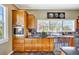 Modern kitchen with updated appliances, granite countertops, stainless steel sink and kitchen window at 4707 Troydale Rd, Tampa, FL 33615