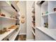 Well-organized pantry with ample shelving and storage space for food and kitchen supplies at 4707 Troydale Rd, Tampa, FL 33615