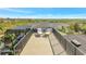 Enjoy breathtaking views from the rooftop deck with two lounge chairs at 4707 Troydale Rd, Tampa, FL 33615