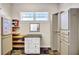 Walk-in closet with built-in shelves and drawers at 4707 Troydale Rd, Tampa, FL 33615