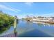Scenic view of a tranquil canal with boat docks and lush greenery on the waterfront at 4707 Troydale Rd, Tampa, FL 33615