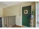 Upstairs unit with a cute green door and decor at 515 Bayview Ne Dr # 4, St Petersburg, FL 33704