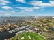 Aerial view of harbor with yacht club and golf course in waterfront community at 5950 Pelican Bay S Plz # Ph-2F, Gulfport, FL 33707