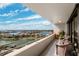 Spacious balcony with beautiful water view, seating area, and plenty of room for relaxing at 5950 Pelican Bay S Plz # Ph-2F, Gulfport, FL 33707