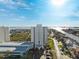 A contemporary high-rise building featuring well-manicured landscaping and convenient parking in a waterfront community at 5950 Pelican Bay S Plz # Ph-2F, Gulfport, FL 33707