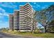 Exterior shot of high-rise condos featuring multiple balconies with scenic views at 5950 Pelican Bay S Plz # Ph-2F, Gulfport, FL 33707