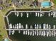 Aerial view of a marina filled with boats docked in orderly rows on a sunny day at 5950 Pelican Bay S Plz # Ph-2F, Gulfport, FL 33707