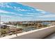 Breathtaking balcony view overlooking the inter-coastal waterway with boats, city skyline, and luxurious waterfront homes at 5950 Pelican Bay S Plz # Ph-2F, Gulfport, FL 33707